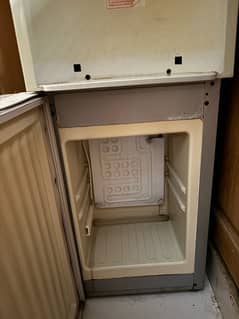 Dispenser with fridge available for sale!