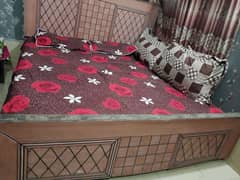 wooden double bed || condition good contact