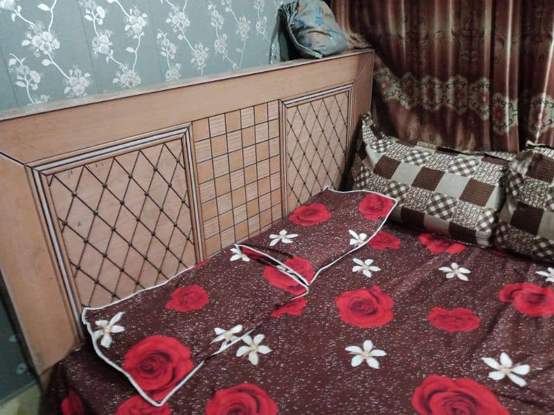 wooden double bed || condition good contact 1