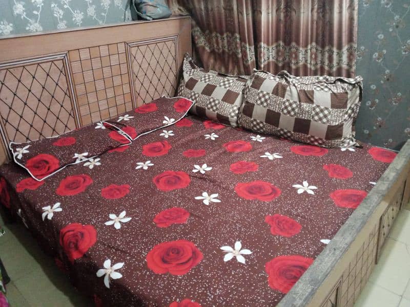 wooden double bed || condition good contact 3
