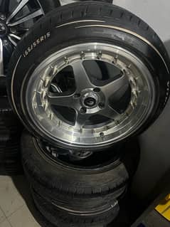 15" deep dish alloy rims with tyres