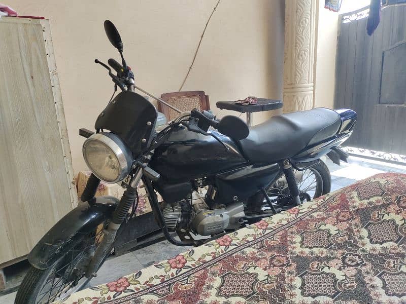 Honda CD 100 Prider black Lahore number 10 by 10 condition 1