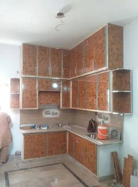 wood works kitchen /wardrobe & doors/ Carpenter services,0324 4075138. 9