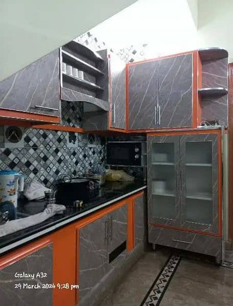 wood works kitchen /wardrobe & doors/ Carpenter services,0324 4075138. 17