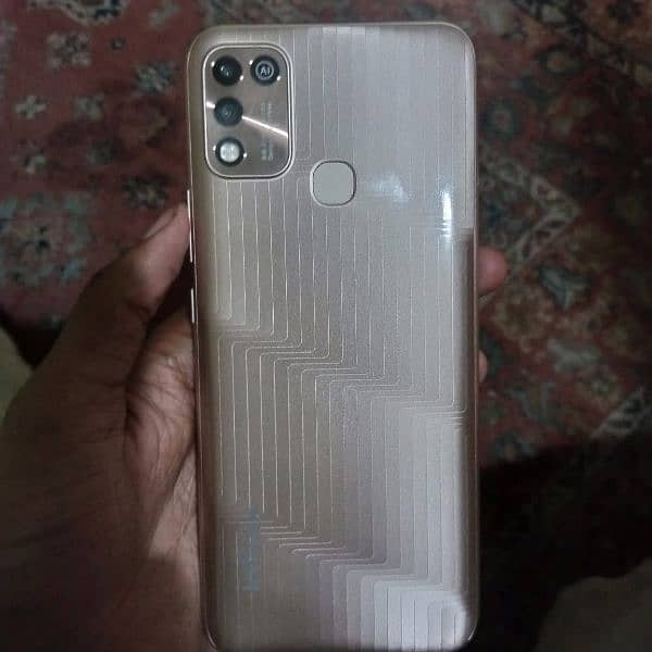 Infinix Hot 10 play with box only one month use 6