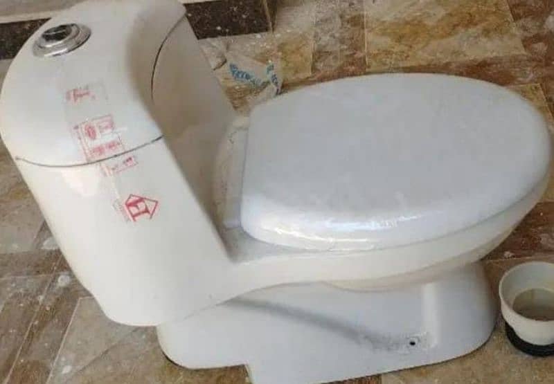 commode seat. white color. brand new 0