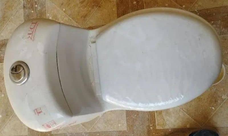 commode seat. white color. brand new 4