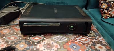 A home used Xbox 360 ultra slim with 55 pre-installed games