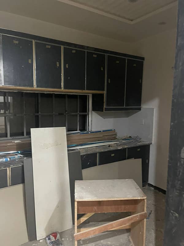 10 Marla Brand New Lower Portion is for rent In UET Society . Prime Location Near Park. Having 2 Bed Attach Bath Tvl Kitchen Drawing Room Store Room Laundry Area Terrace Servant Bath Car Parking Fully Marble And Wooden Tiles. Rent Demand 65,000 6