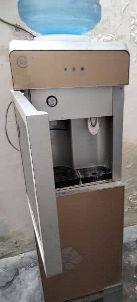 Imported water Dispenser with bottle and chowki free 1