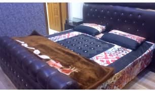 chocolate Brown double bed with two side tables