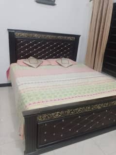 king size wooden bed for sale in neat n clean condition.
