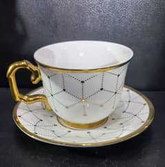 imported tea set with 6 cups and 6 saucers