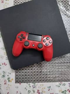 PlayStation 4 Slim with controller, peripherals and video game