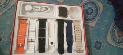 smart ultra watch and seven straps  and one pouch and one charger