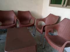 set of 4 100% pure plastic chairs with 1 Plastic table