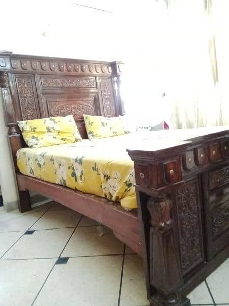 king size bed with 2 side tables and dressing table 0