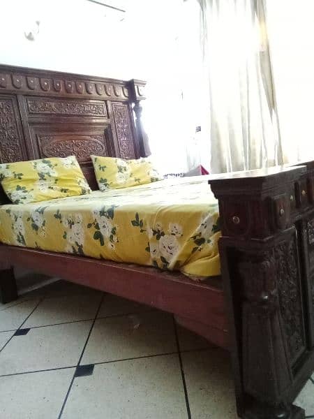 king size bed with 2 side tables and dressing table 1