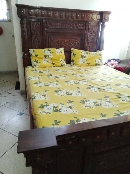 king size bed with 2 side tables and dressing table 4