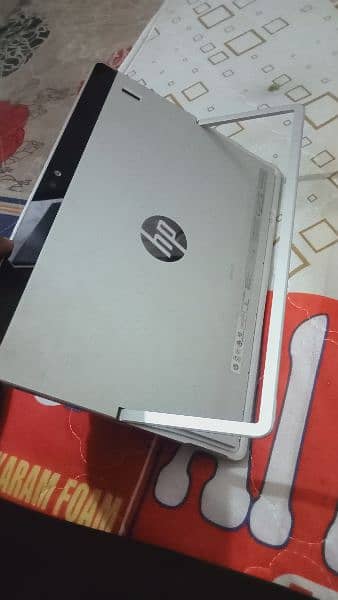 hp laptop mackbook and tablet 2