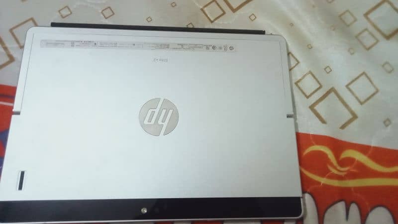 hp laptop mackbook and tablet 4