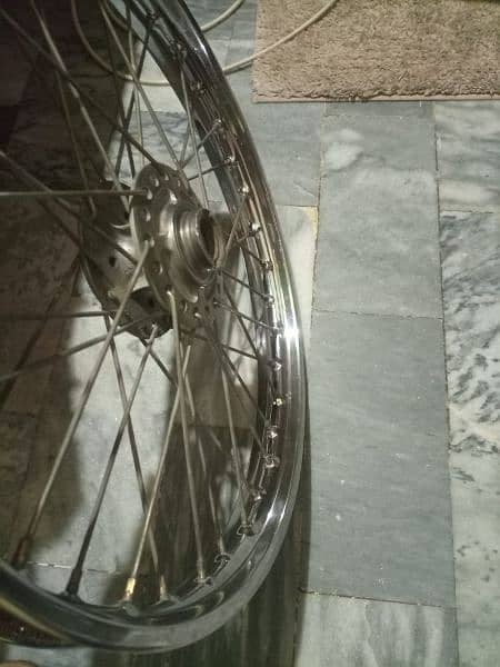 Kawasaki front full wheel with bring all genuine 3