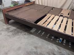 wooden bed with daraz and back space