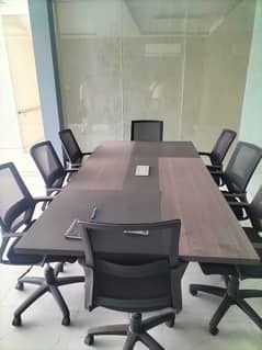 Conference table with 10 chairs