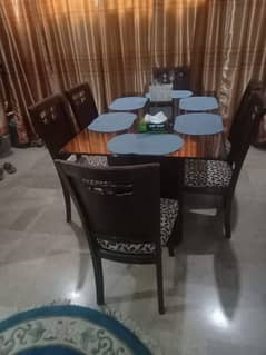 Glass dinning table with 6 chairs