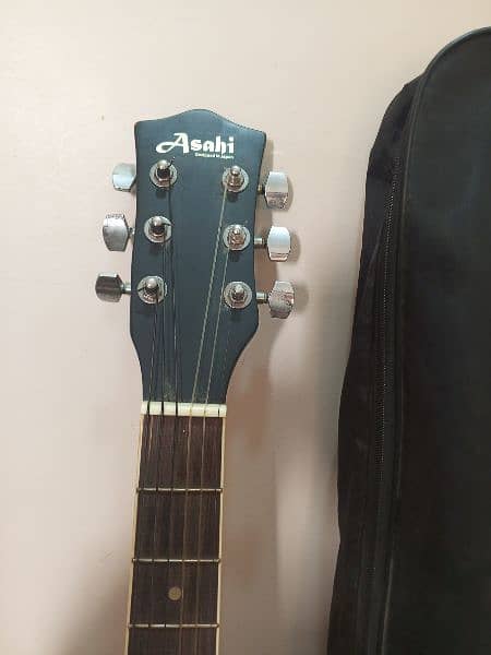 Guitar with bag, picks and L key 5