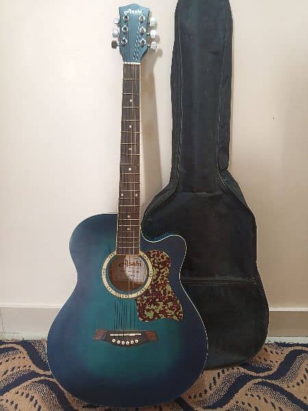 Guitar with bag, picks and L key 8