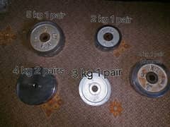 WEIGHT PLATES ALONG WITH DUMBBELL RODS AND BARBELL ROD