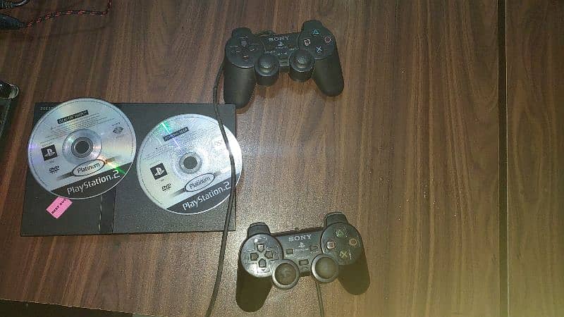 Playstation 2 ultra slim (negotiable price) 5