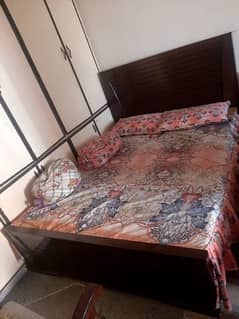 Double bed with mattress.