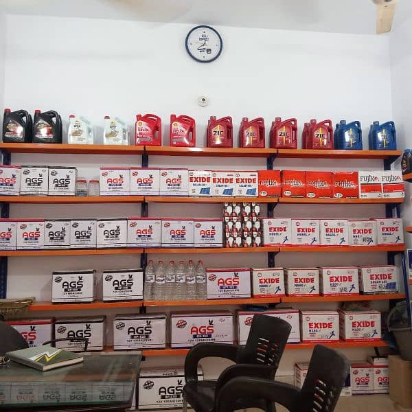 Shop  for sale consisting of Auto Parts +Battery+Oil, Batt. Charger 3