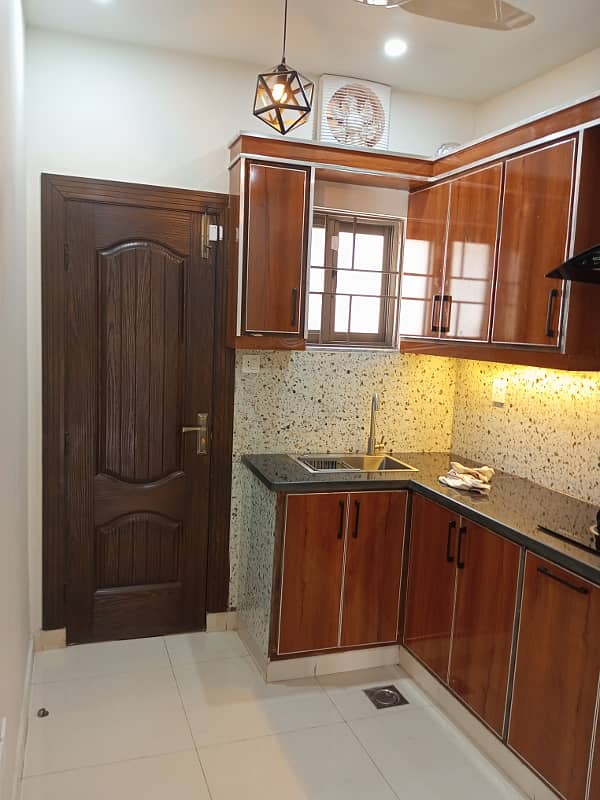 Spacious 5 Marla Brand New Designer House, 3 Bed Room With Attached Bath, Drawing Dinning, Kitchen,T. V Lounge Servant Quarter On Top With Attached Bath 4