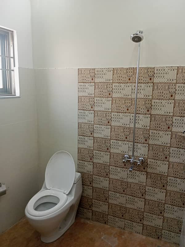 Spacious 5 Marla Brand New Designer House, 3 Bed Room With Attached Bath, Drawing Dinning, Kitchen,T. V Lounge Servant Quarter On Top With Attached Bath 10
