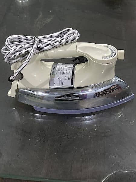 Panasonic dry iron. if you're interested you can contact me on WhatsApp 3
