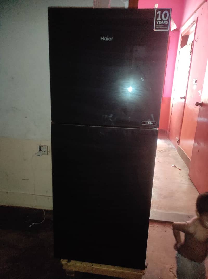 Haier glass door Refrigerator just like new 2