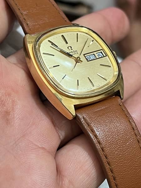 omega quartz day/date men,s watch swiss made 1