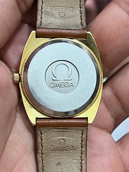 omega quartz day/date men,s watch swiss made 5