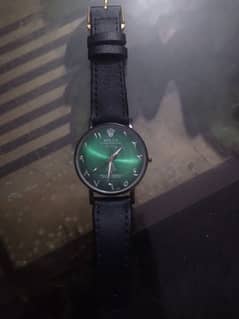 green dial watch