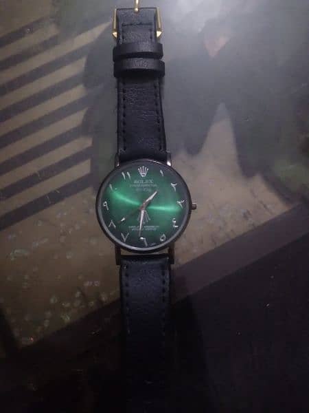 green dial watch 0