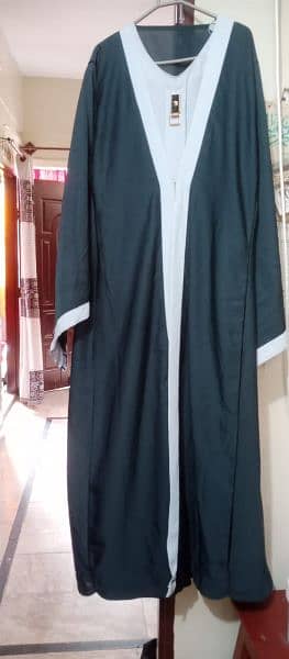 abaya color dark Green with White condition 10/10 hai 1