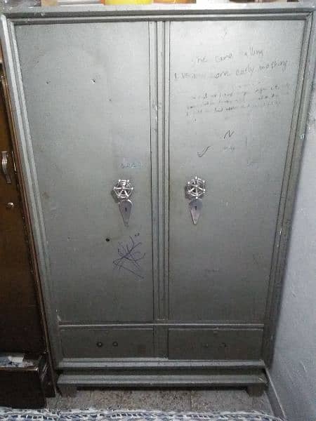 metal wardrobe with locked safe inside 0