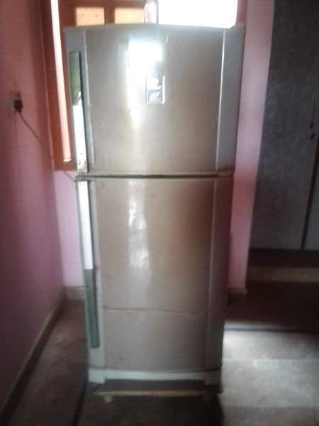 Condition ok medium size Dawlance refrigerator 0