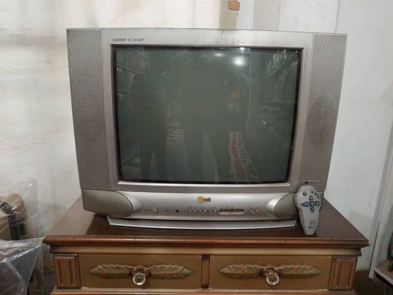 LG tv 21" whit tv trolly for sale 0