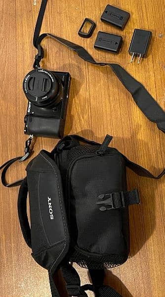 "Sony A6000 Mirrorless Camera Kit with 16-50mm Lens ," 0