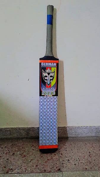 high quality full size German bat new condition. with free bat cover. 0