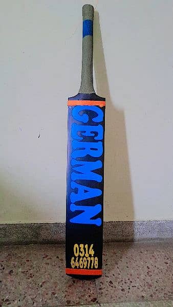 high quality full size German bat new condition. with free bat cover. 1